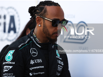 Lewis Hamilton walks in the paddock at Circuit of the Americas in Austin, Texas, on October 17, 2024. (