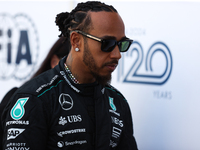 Lewis Hamilton walks in the paddock at Circuit of the Americas in Austin, Texas, on October 17, 2024. (