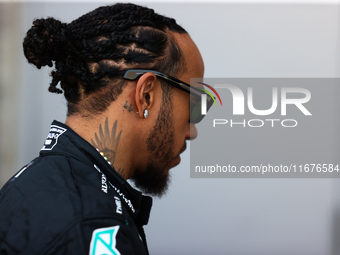 Lewis Hamilton walks in the paddock at Circuit of the Americas in Austin, Texas, on October 17, 2024. (