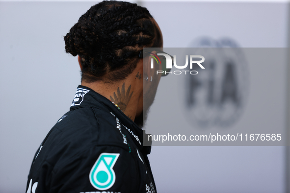 Lewis Hamilton walks in the paddock at Circuit of the Americas in Austin, Texas, on October 17, 2024. 