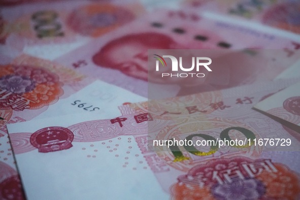 In Hangzhou, China, on October 18, 2024, a photo shows Chinese yuan. On the same day, the Bank of China, Industrial and Commercial Bank of C...