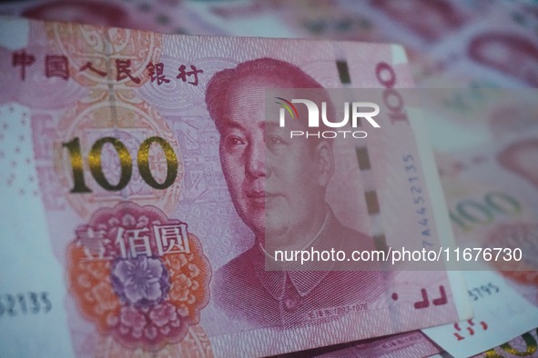 In Hangzhou, China, on October 18, 2024, a photo shows Chinese yuan. On the same day, the Bank of China, Industrial and Commercial Bank of C...