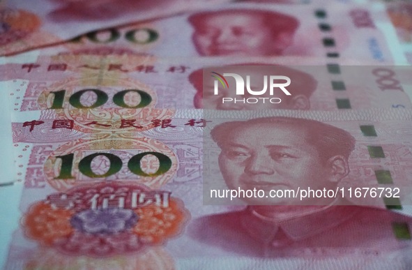 In Hangzhou, China, on October 18, 2024, a photo shows Chinese yuan. On the same day, the Bank of China, Industrial and Commercial Bank of C...