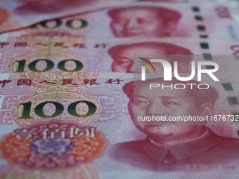 In Hangzhou, China, on October 18, 2024, a photo shows Chinese yuan. On the same day, the Bank of China, Industrial and Commercial Bank of C...