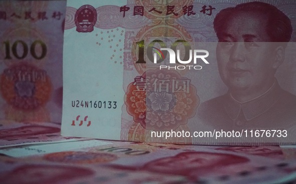 In Hangzhou, China, on October 18, 2024, a photo shows Chinese yuan. On the same day, the Bank of China, Industrial and Commercial Bank of C...