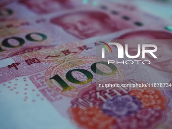 In Hangzhou, China, on October 18, 2024, a photo shows Chinese yuan. On the same day, the Bank of China, Industrial and Commercial Bank of C...