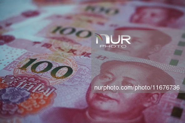 In Hangzhou, China, on October 18, 2024, a photo shows Chinese yuan. On the same day, the Bank of China, Industrial and Commercial Bank of C...