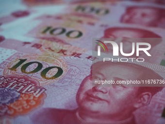 In Hangzhou, China, on October 18, 2024, a photo shows Chinese yuan. On the same day, the Bank of China, Industrial and Commercial Bank of C...