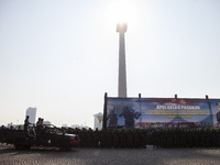 Thousands of armed forces and police personnel take part in a troop roll call at the National Monument in Jakarta, Indonesia, on October 18,...