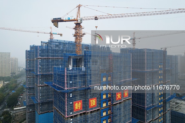 A newly built residential complex is shown in Hangzhou, China, on October 17, 2024. According to data released by the National Bureau of Sta...