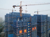 A newly built residential complex is shown in Hangzhou, China, on October 17, 2024. According to data released by the National Bureau of Sta...