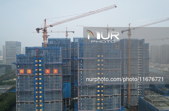 A newly built residential complex is shown in Hangzhou, China, on October 17, 2024. According to data released by the National Bureau of Sta...