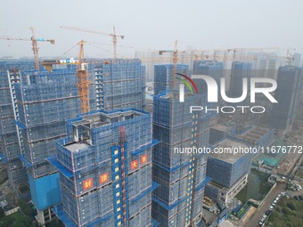 A newly built residential complex is shown in Hangzhou, China, on October 17, 2024. According to data released by the National Bureau of Sta...