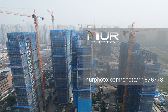 A newly built residential complex is shown in Hangzhou, China, on October 17, 2024. According to data released by the National Bureau of Sta...