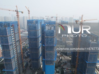 A newly built residential complex is shown in Hangzhou, China, on October 17, 2024. According to data released by the National Bureau of Sta...