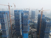 A newly built residential complex is shown in Hangzhou, China, on October 17, 2024. According to data released by the National Bureau of Sta...