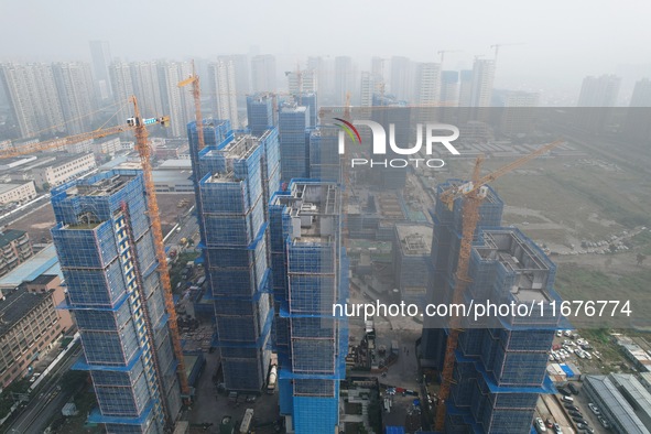 A newly built residential complex is shown in Hangzhou, China, on October 17, 2024. According to data released by the National Bureau of Sta...