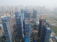 A newly built residential complex is shown in Hangzhou, China, on October 17, 2024. According to data released by the National Bureau of Sta...