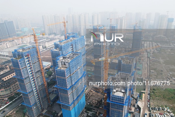 A newly built residential complex is shown in Hangzhou, China, on October 17, 2024. According to data released by the National Bureau of Sta...