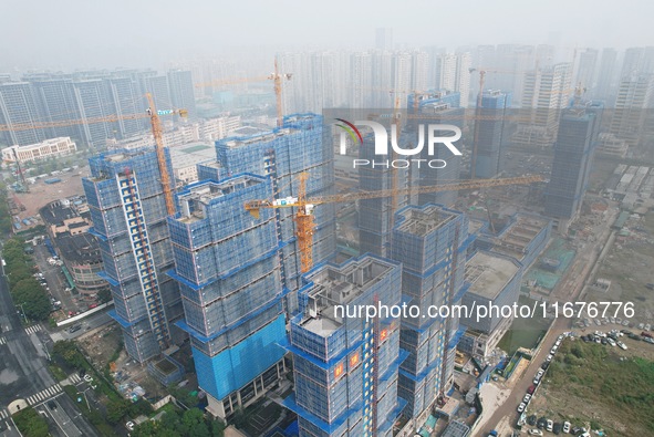 A newly built residential complex is shown in Hangzhou, China, on October 17, 2024. According to data released by the National Bureau of Sta...