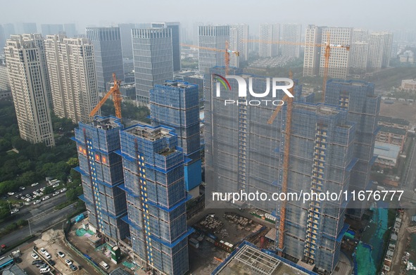 A newly built residential complex is shown in Hangzhou, China, on October 17, 2024. According to data released by the National Bureau of Sta...