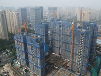 A newly built residential complex is shown in Hangzhou, China, on October 17, 2024. According to data released by the National Bureau of Sta...