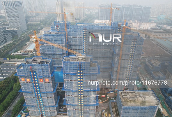 A newly built residential complex is shown in Hangzhou, China, on October 17, 2024. According to data released by the National Bureau of Sta...