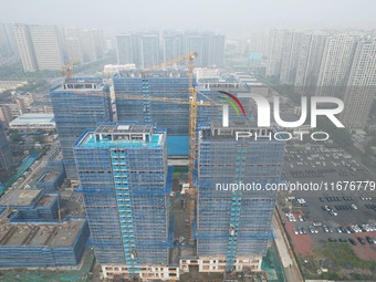 A newly built residential complex is shown in Hangzhou, China, on October 17, 2024. According to data released by the National Bureau of Sta...