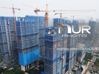 A newly built residential complex is shown in Hangzhou, China, on October 17, 2024. According to data released by the National Bureau of Sta...