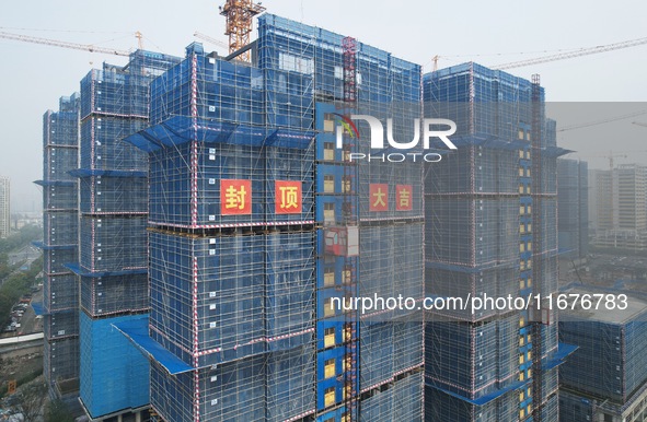 A newly built residential complex is shown in Hangzhou, China, on October 17, 2024. According to data released by the National Bureau of Sta...