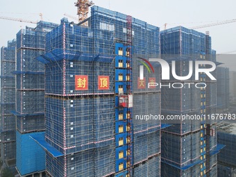 A newly built residential complex is shown in Hangzhou, China, on October 17, 2024. According to data released by the National Bureau of Sta...