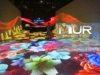 A three-dimensional light show takes place at Landmark Shopping Mall on Nanjing Road Pedestrian Street in Shanghai, China, on October 15, 20...