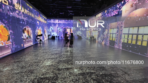 A three-dimensional light show takes place at Landmark Shopping Mall on Nanjing Road Pedestrian Street in Shanghai, China, on October 15, 20...