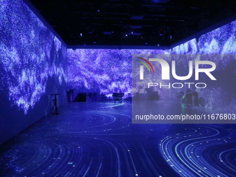 A three-dimensional light show takes place at Landmark Shopping Mall on Nanjing Road Pedestrian Street in Shanghai, China, on October 15, 20...