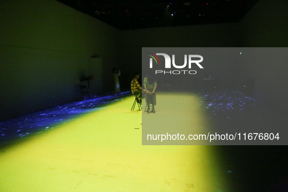 A three-dimensional light show takes place at Landmark Shopping Mall on Nanjing Road Pedestrian Street in Shanghai, China, on October 15, 20...