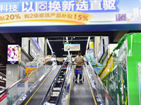 Consumers shop at a supermarket in Qingzhou, China, on October 13, 2024. On October 13, 2024, data released by the National Bureau of Statis...