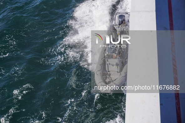 In Gdynia, Poland, on July 31, 2024, Naval Special Operations Unit Formoza soldiers escort a StenaLine ferry on its way from Gdynia, Poland,...