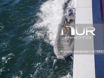 In Gdynia, Poland, on July 31, 2024, Naval Special Operations Unit Formoza soldiers escort a StenaLine ferry on its way from Gdynia, Poland,...