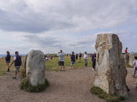 People visit Ales Stenar, also called the Swedish Stonehenge, in Kaseberga, near Ystad, Scane, Sweden, on August 3, 2024. Ales Stenar is a m...