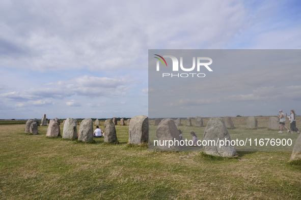 People visit Ales Stenar, also called the Swedish Stonehenge, in Kaseberga, near Ystad, Scane, Sweden, on August 3, 2024. Ales Stenar is a m...