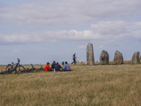 People visit Ales Stenar, also called the Swedish Stonehenge, in Kaseberga, near Ystad, Scane, Sweden, on August 3, 2024. Ales Stenar is a m...