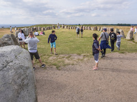 People visit Ales Stenar, also called the Swedish Stonehenge, in Kaseberga, near Ystad, Scane, Sweden, on August 3, 2024. Ales Stenar is a m...