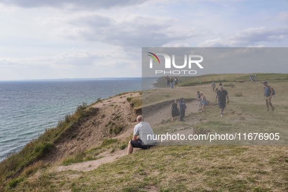 People visit Ales Stenar, also called the Swedish Stonehenge, in Kaseberga, near Ystad, Scane, Sweden, on August 3, 2024. Ales Stenar is a m...