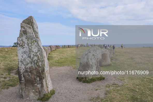 People visit Ales Stenar, also called the Swedish Stonehenge, in Kaseberga, near Ystad, Scane, Sweden, on August 3, 2024. Ales Stenar is a m...