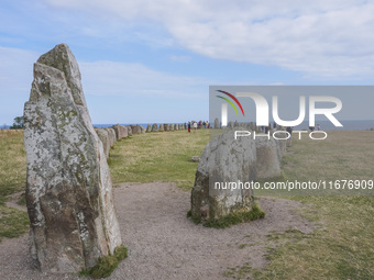 People visit Ales Stenar, also called the Swedish Stonehenge, in Kaseberga, near Ystad, Scane, Sweden, on August 3, 2024. Ales Stenar is a m...