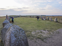 People visit Ales Stenar, also called the Swedish Stonehenge, in Kaseberga, near Ystad, Scane, Sweden, on August 3, 2024. Ales Stenar is a m...