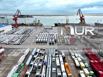 A large number of vehicles collect for shipment at the port of Lianyungang in Jiangsu province, China, on October 18, 2024. (