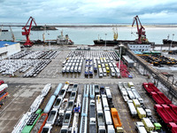 A large number of vehicles collect for shipment at the port of Lianyungang in Jiangsu province, China, on October 18, 2024. (