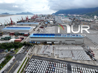 A large number of vehicles are collected for shipment at the port of Lianyungang in Jiangsu province, China, on October 18, 2024. (