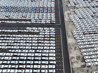 A large number of vehicles are collected for shipment at the port of Lianyungang in Jiangsu province, China, on October 18, 2024. (